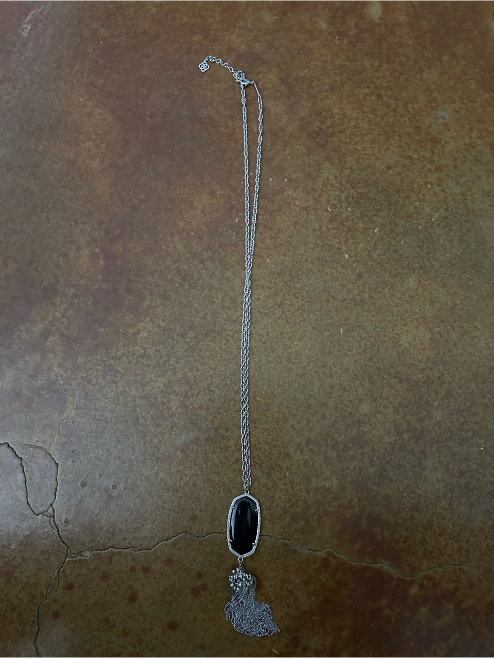 Kendra Scott Silver Necklace with Black Oval Pendant and Tassel